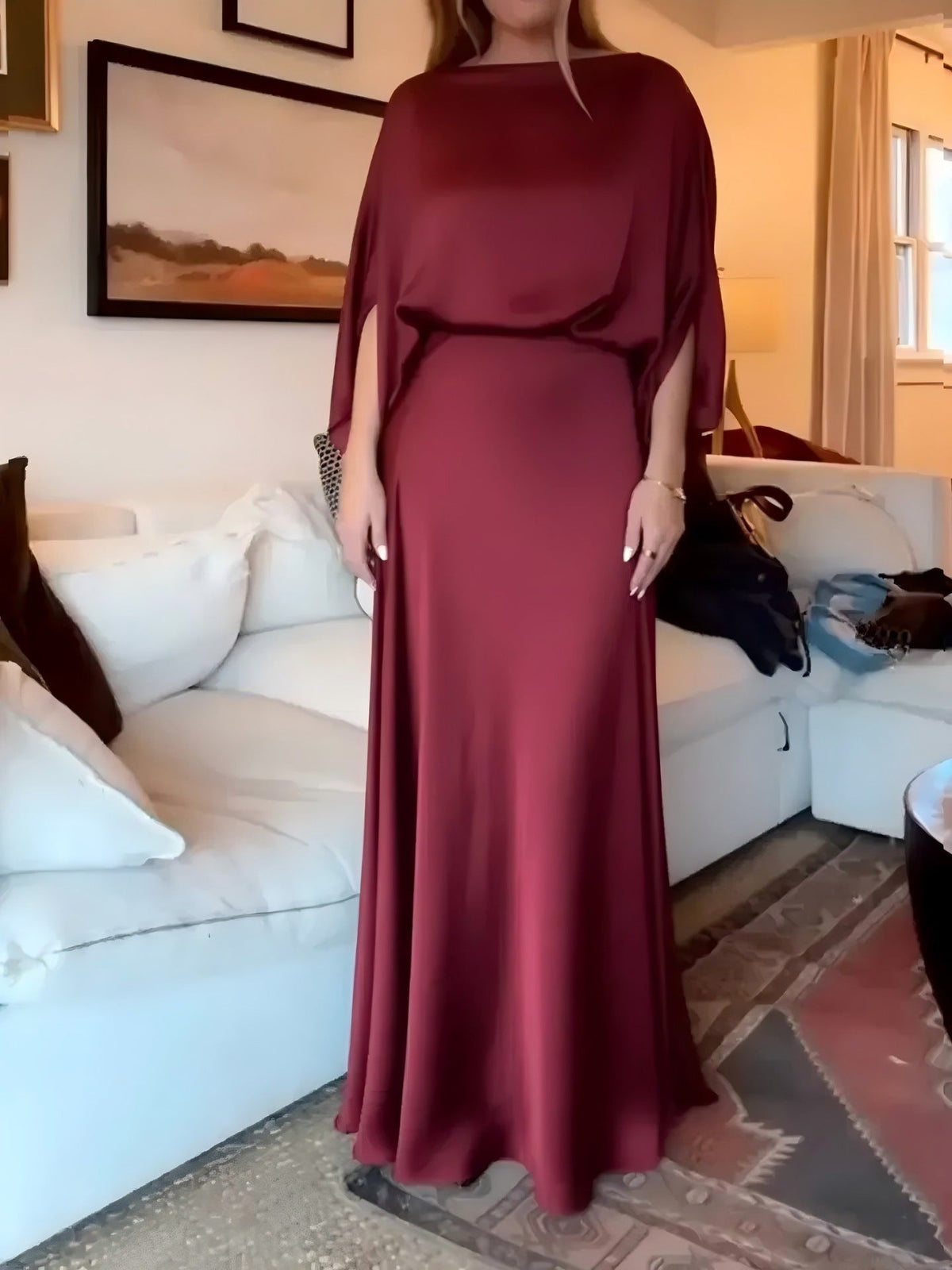A Sleek Solid-color Satin Dress With Smooth Lines