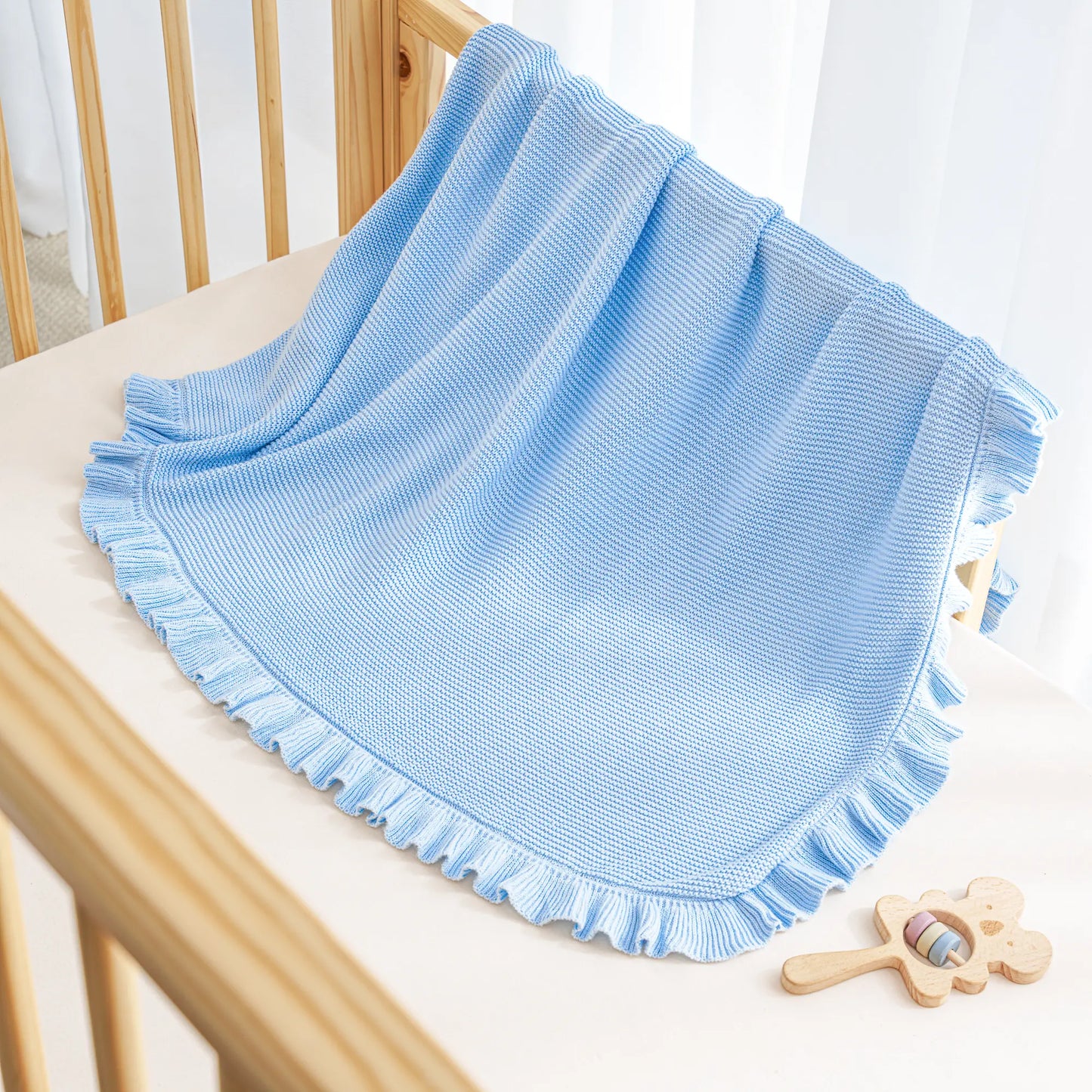 Ruffled Edge Knit Baby Blanket in Baby Blue