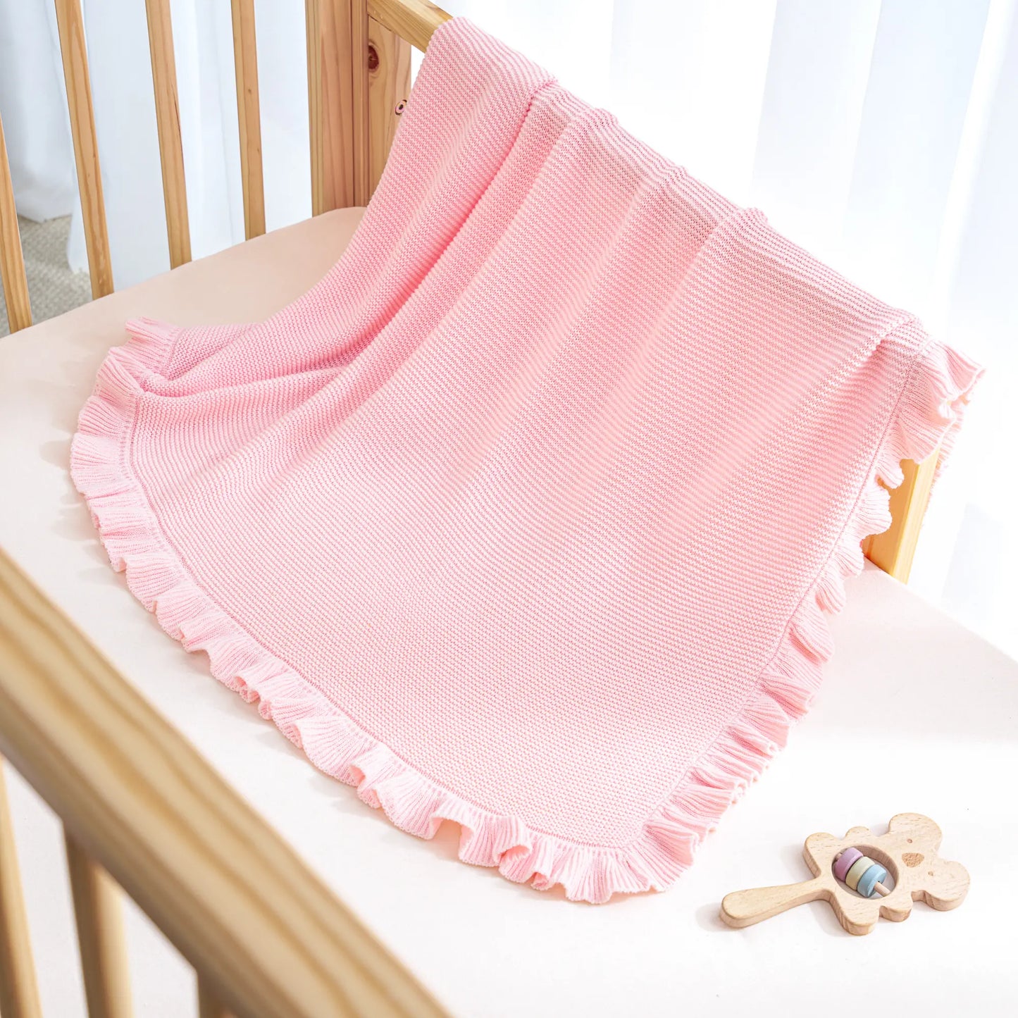 Ruffled Edge Knit Baby Blanket in Pink