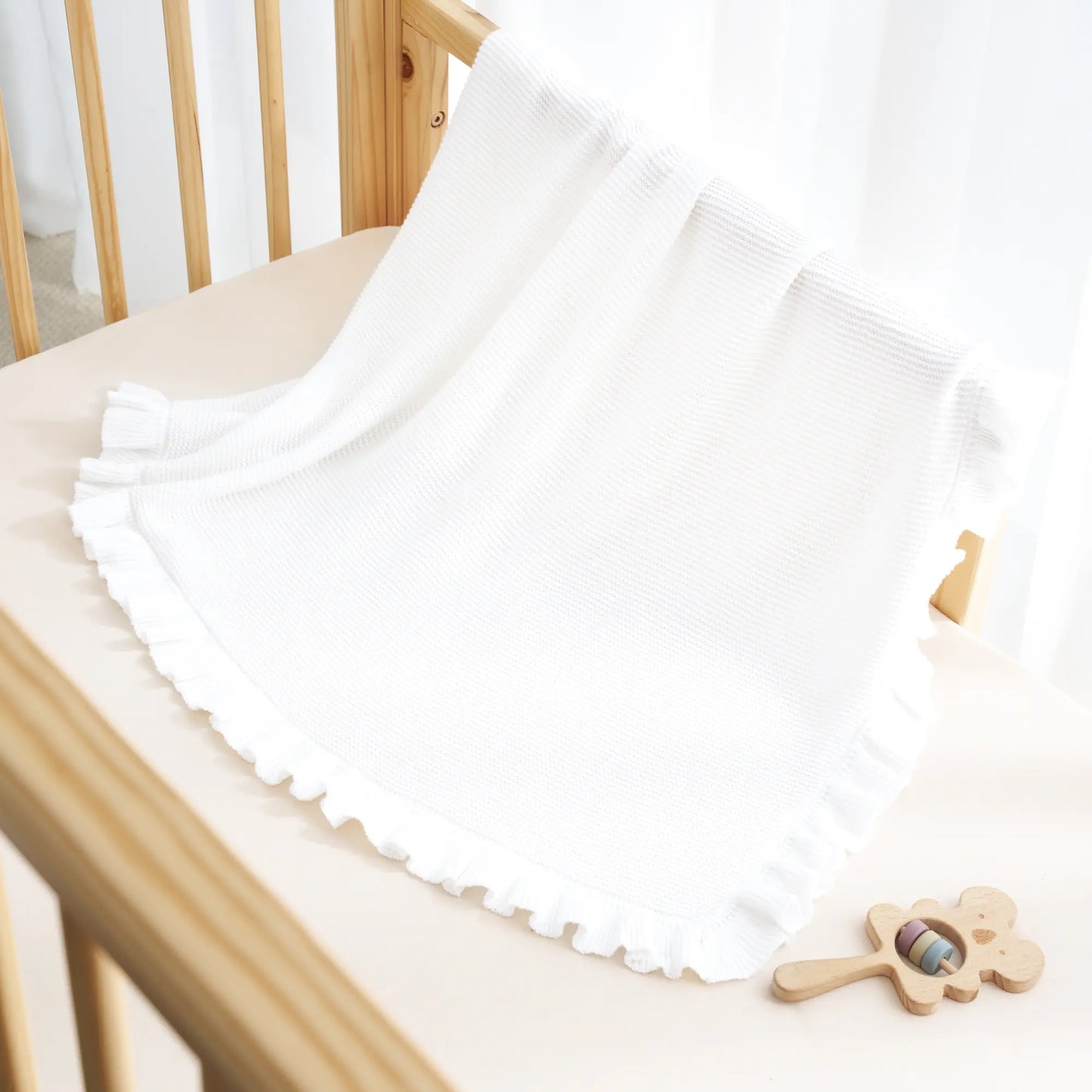 Ruffled Edge Knit Baby Blanket in White