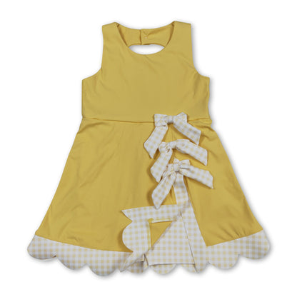 Sleeveless bow yellow scallop girls athletic dress