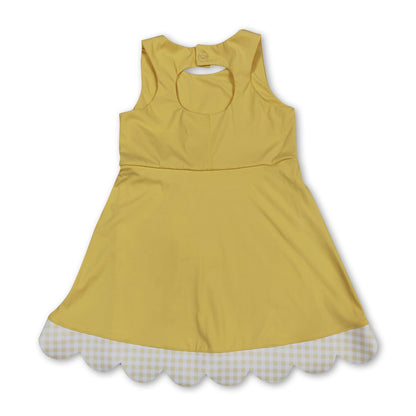 Sleeveless bow yellow scallop girls athletic dress